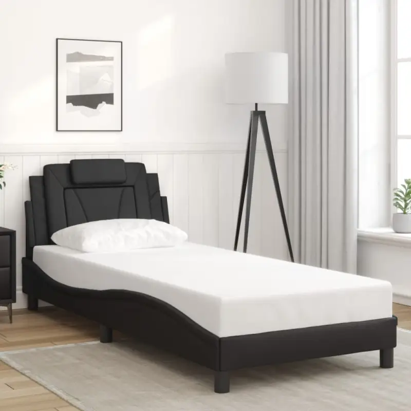 Zwart bedframe met hoofdeinde en multiplex lattenbodem voor comfortabel slapen